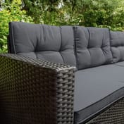 Black rattan set glass table detail