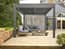 Nexus Grey Louvred Pergola - Rear Screen Down on Stone Patio