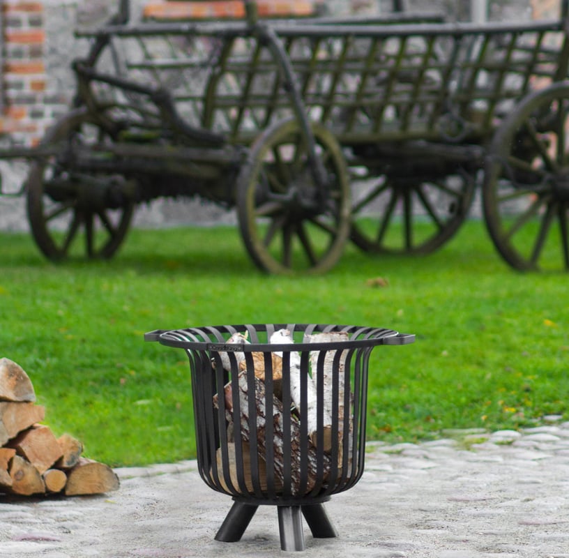Cook King Verona 60cm steel fire basket with high cage walls and integrated ash tray in a UK garden