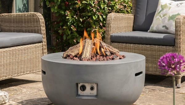How to Light a Fire Pit (and Keep It Going) Without the Smoke