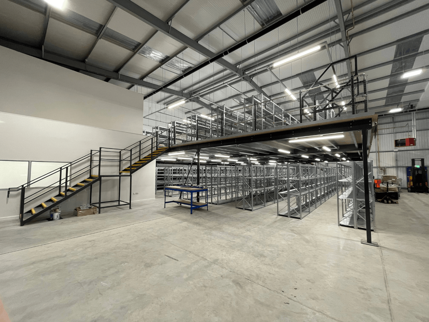 Completed cromwell tools bristol hub fit out with mezzanine floor, warehouse shelving and staircase access