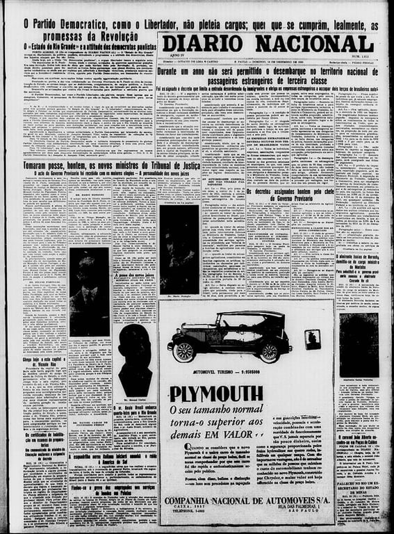 Recorte de jornal em preto e branco da primeira metade do século XX. O título do jornal aparece em destaque no topo da página: 'DIÁRIO NACIONAL', em letras grandes e maiúsculas. A edição é de domingo, 14 de dezembro de 1930, publicada em São Paulo. A manchete central, em letras grandes e negritadas, informa: 'Durante um anno não será permitido o desembarque no território nacional de passageiros estrangeiros de terceira classe'. Abaixo da manchete, o subtítulo diz: 'Foi assinado o decreto que limita a entrada desordenada de immigrantes e obriga as empresas estrangeiras a occuparem dois terços de brasileiros natos'.