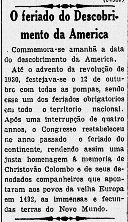Recorte de jornal em preto e branco com o título em destaque 'O feriado do Descobrimento da América', escrito em letras grandes e em negrito, seguido por um texto justificando a comemoração da data. O artigo informa que se comemorava, no dia seguinte, o 'descobrimento da América' e explica que, até a Revolução de 1930, o 12 de outubro era celebrado com pompa em todo o território nacional como feriado obrigatório. Após quatro anos de interrupção, o Congresso havia restabelecido esse feriado no ano anterior ao da publicação da matéria. O texto finaliza afirmando que a comemoração era uma 'justa homenagem' à memória de Cristóvão Colombo e seus companheiros, que revelaram aos europeus 'as imensas e fecundas terras do Novo Mundo'. O tom e o conteúdo do texto refletem uma visão eurocêntrica e colonizadora, exaltando Colombo e ignorando as violências e os povos originários da América.