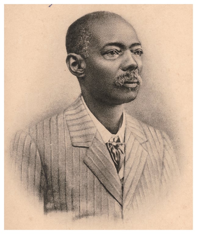 Desenho em tom sépia de um homem negro, de meia-idade, retratado de busto. Ele tem rosto sério, cabelos curtos e bigode fino. Usa um terno de listras verticais, camisa clara e gravata. O fundo é neutro, sem detalhes, destacando sua figura de forma solene e respeitosa.