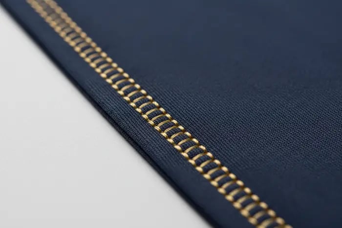 Flatlock seam stitching for zero-chafe riding comfort