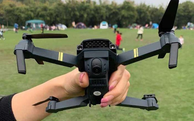 black falcon 4k drone holding
