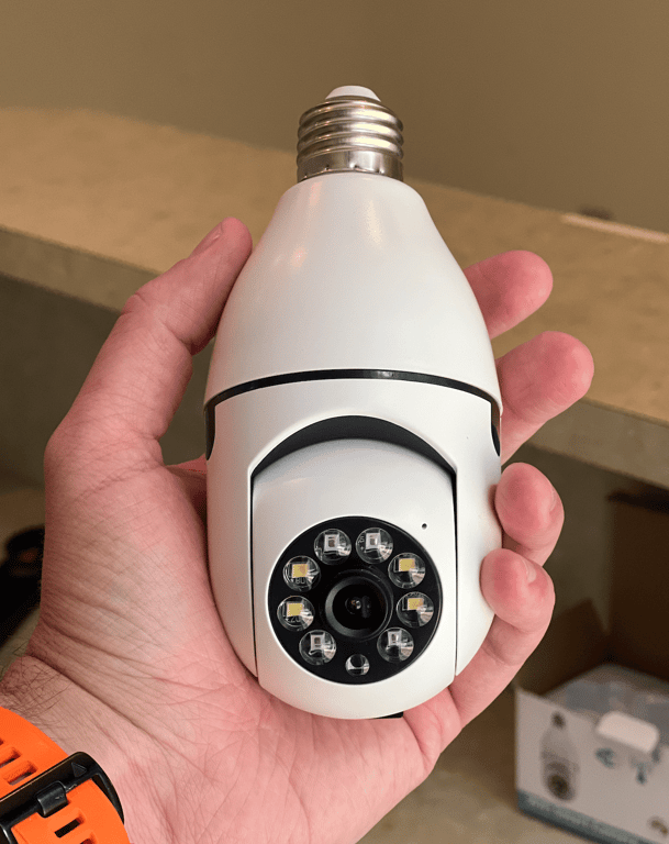 holding light security cam