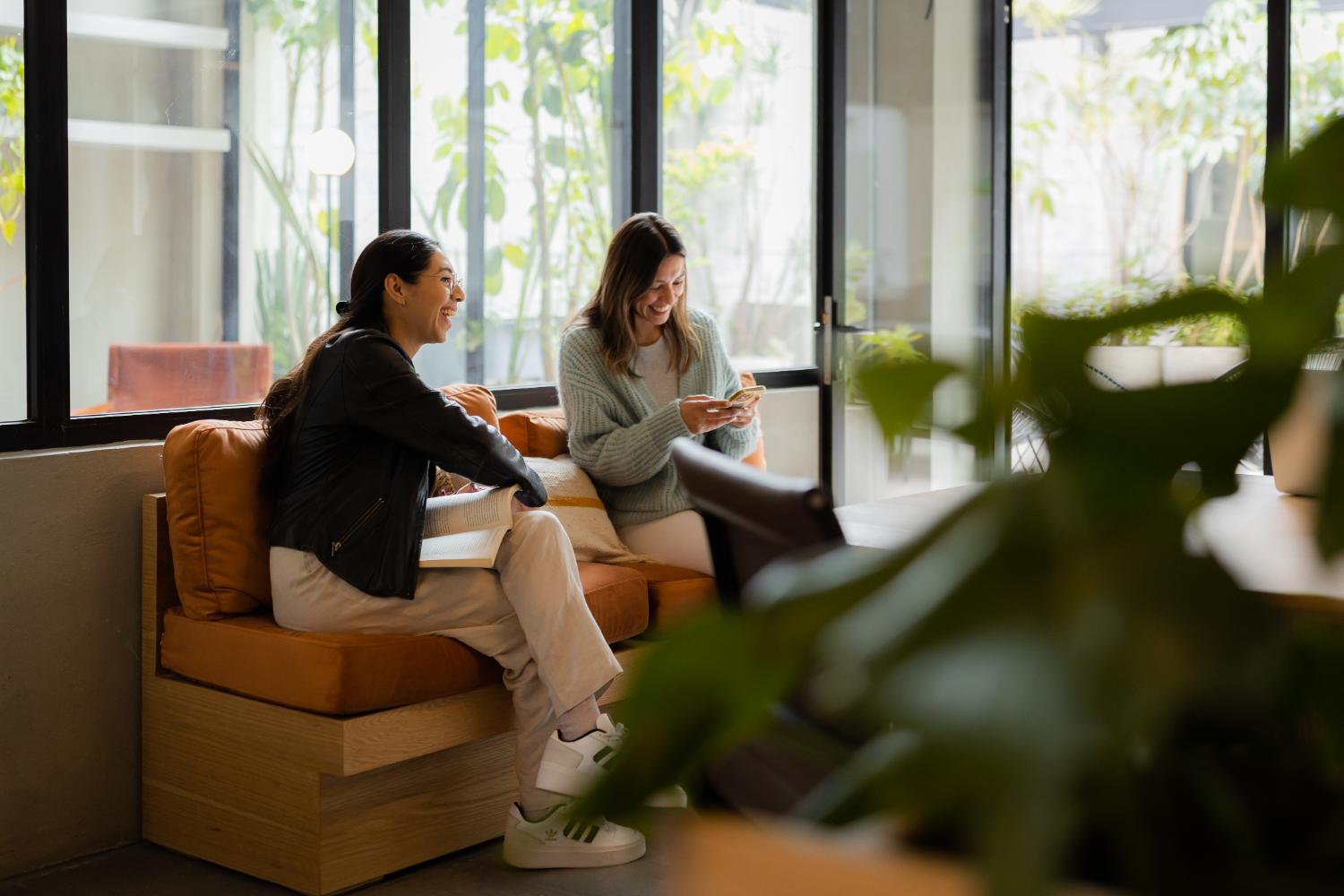 Members chatting in the communal lounge