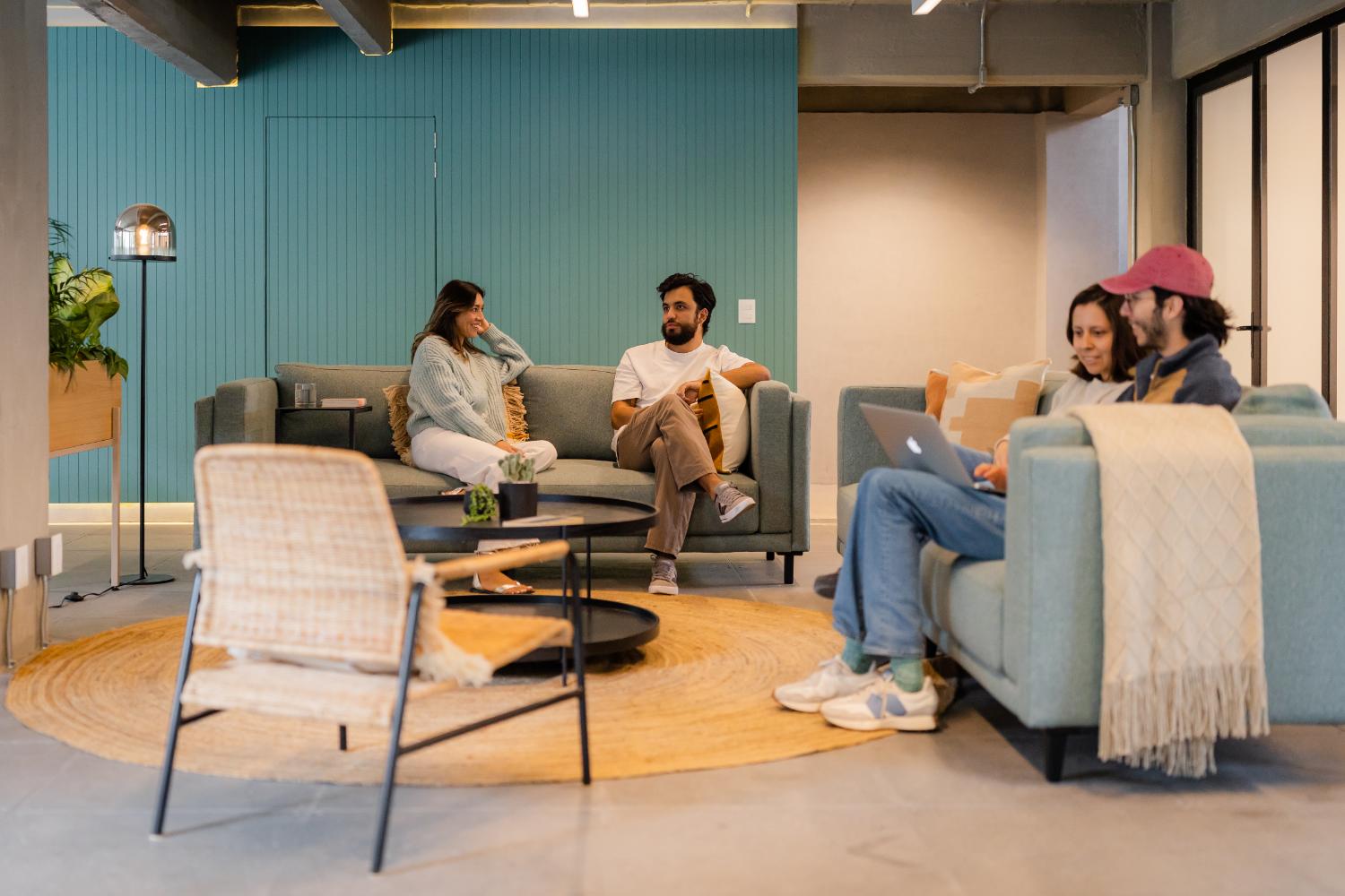 Members relaxing in the communal living room