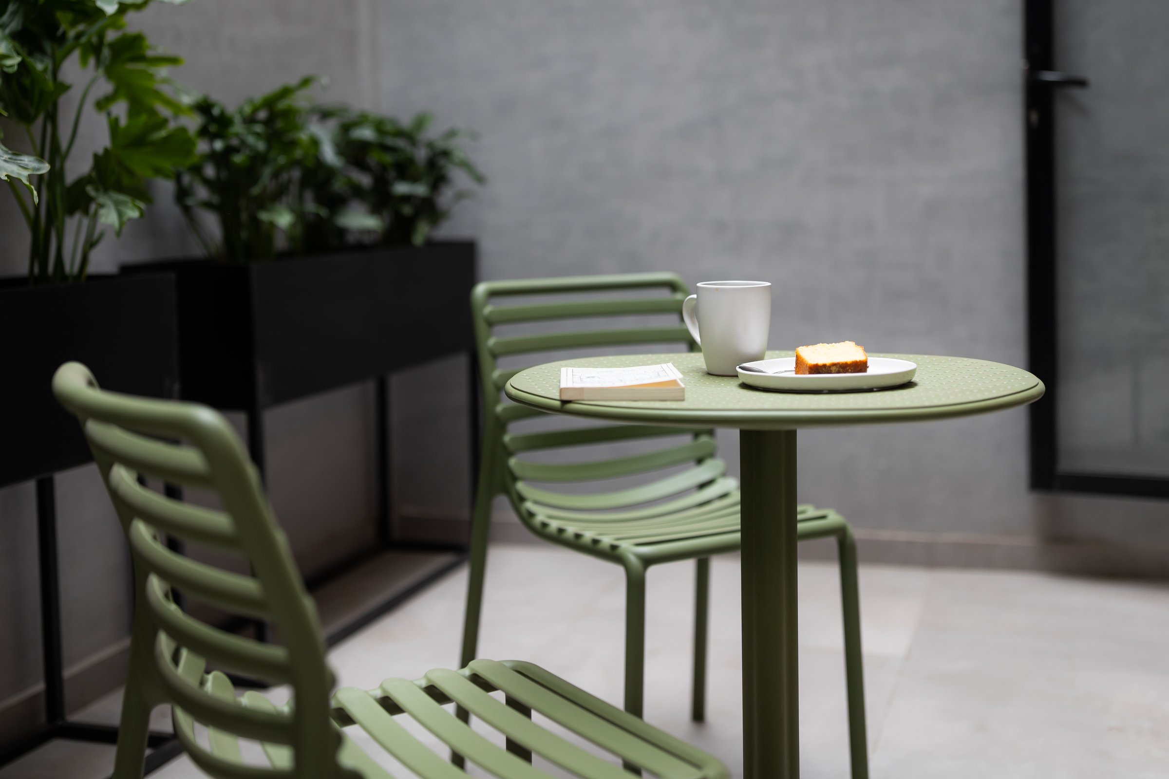 Outdoor terrace with seating and plants