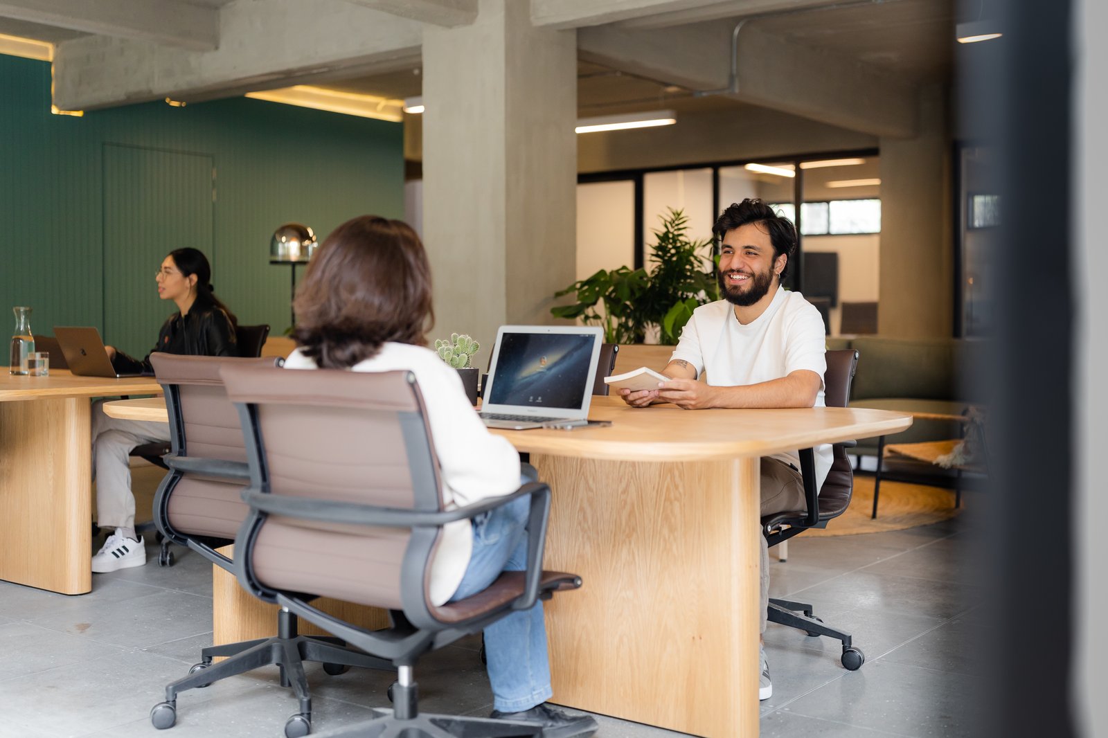 Dedicated coworking desks with ergonomic chairs