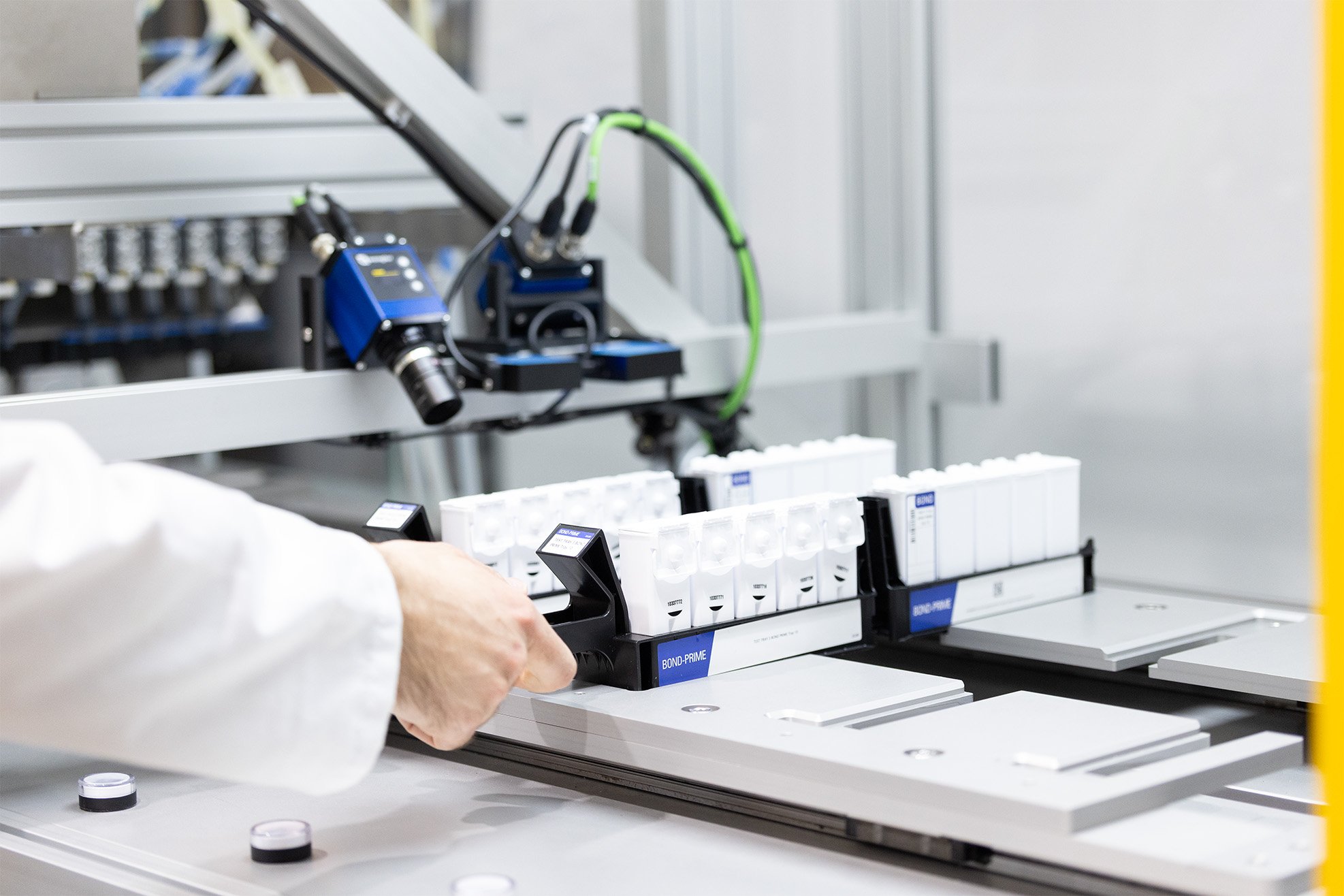 Liquid filling system being loaded with two trays of samples