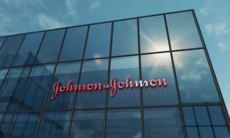 Glass fronted building with sun burst and Johnson & Johnson sign