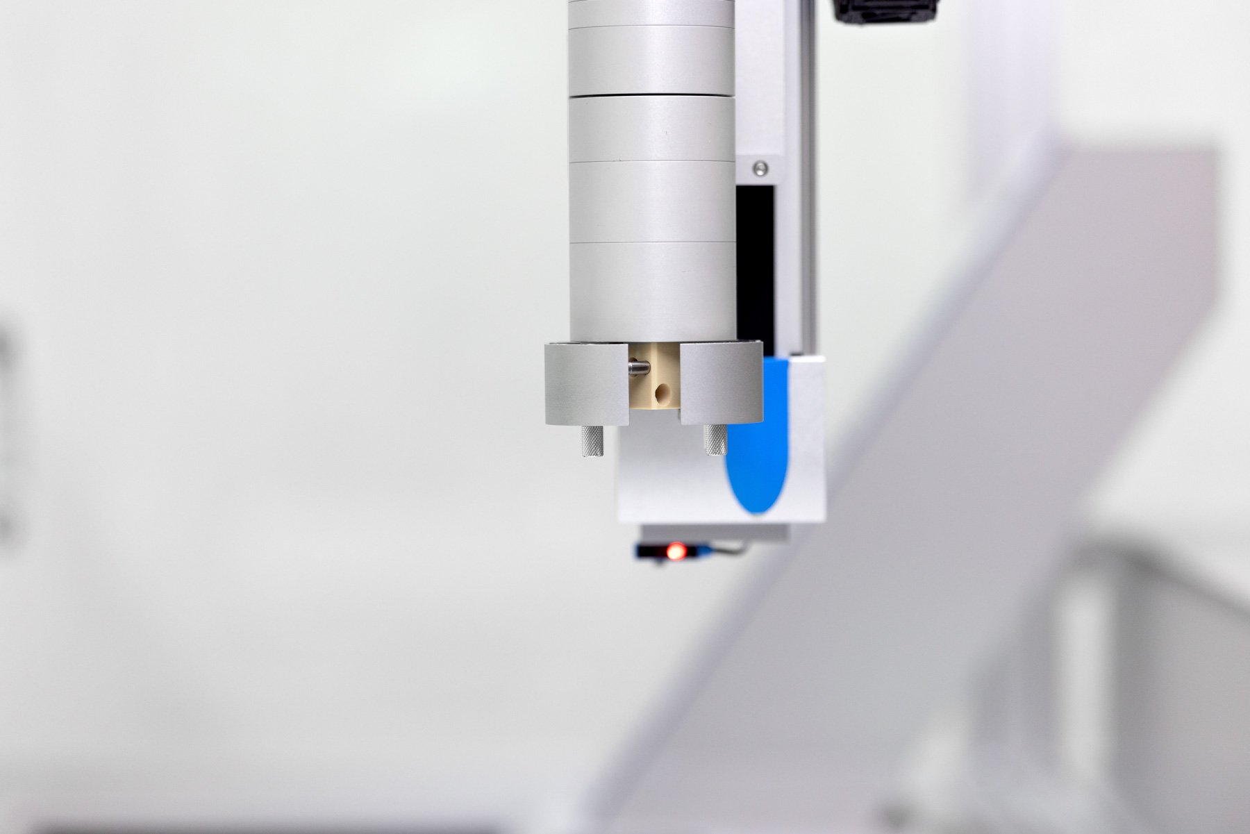 Labman's electric gripper on a formulation system
