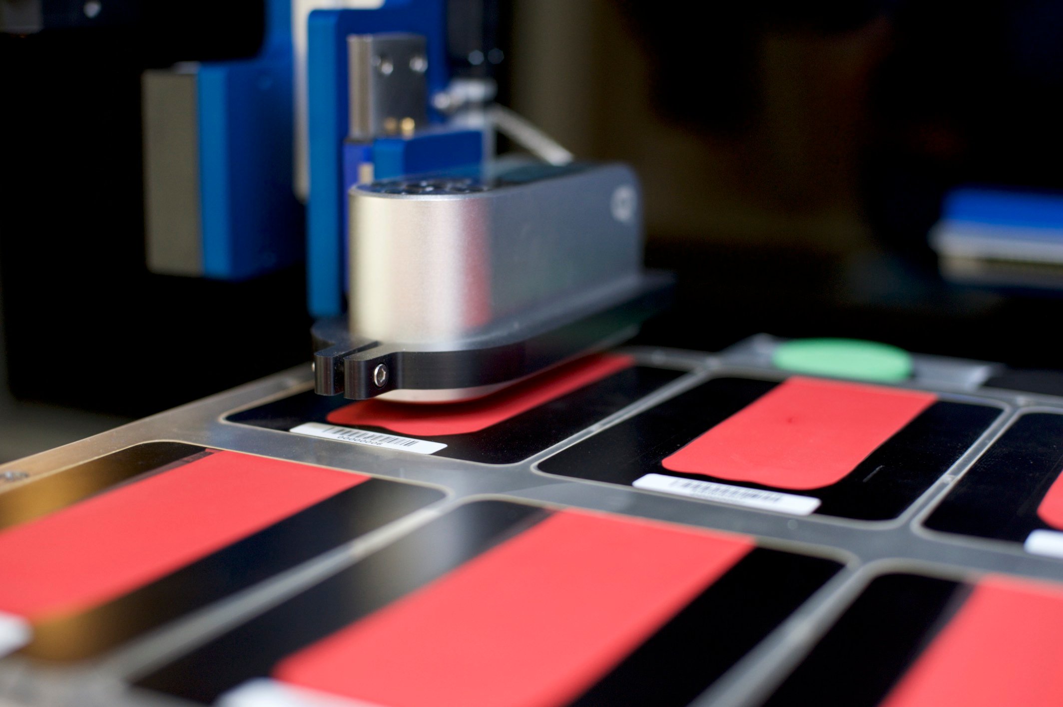 Panels of red paint ready for testing