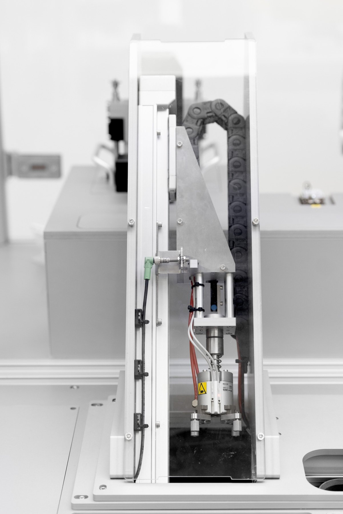 A custom built dual asymmetric centrifuge (DAC) loading system