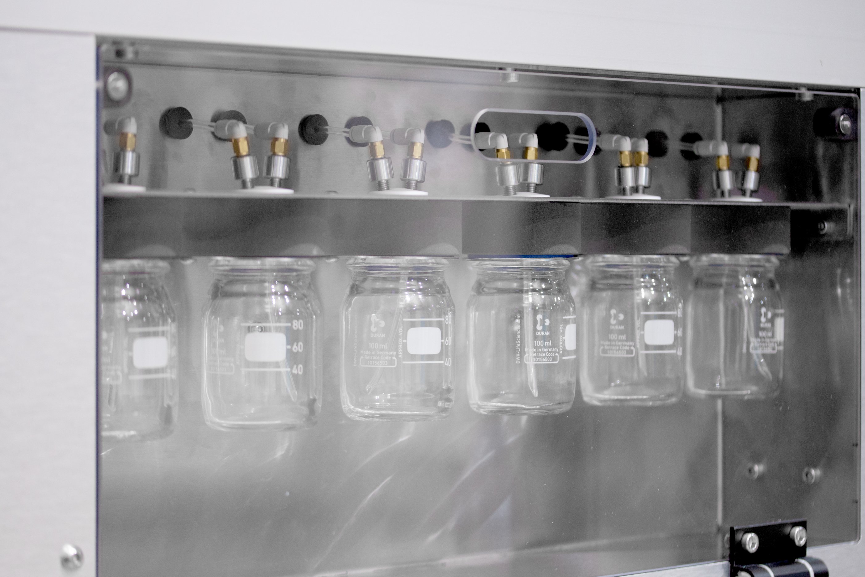 row of catchpots to capture any liquid overflow