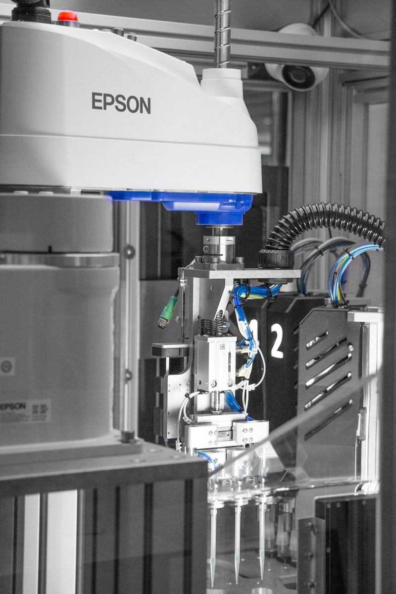 A piece of Epson technology in a silver lab setting