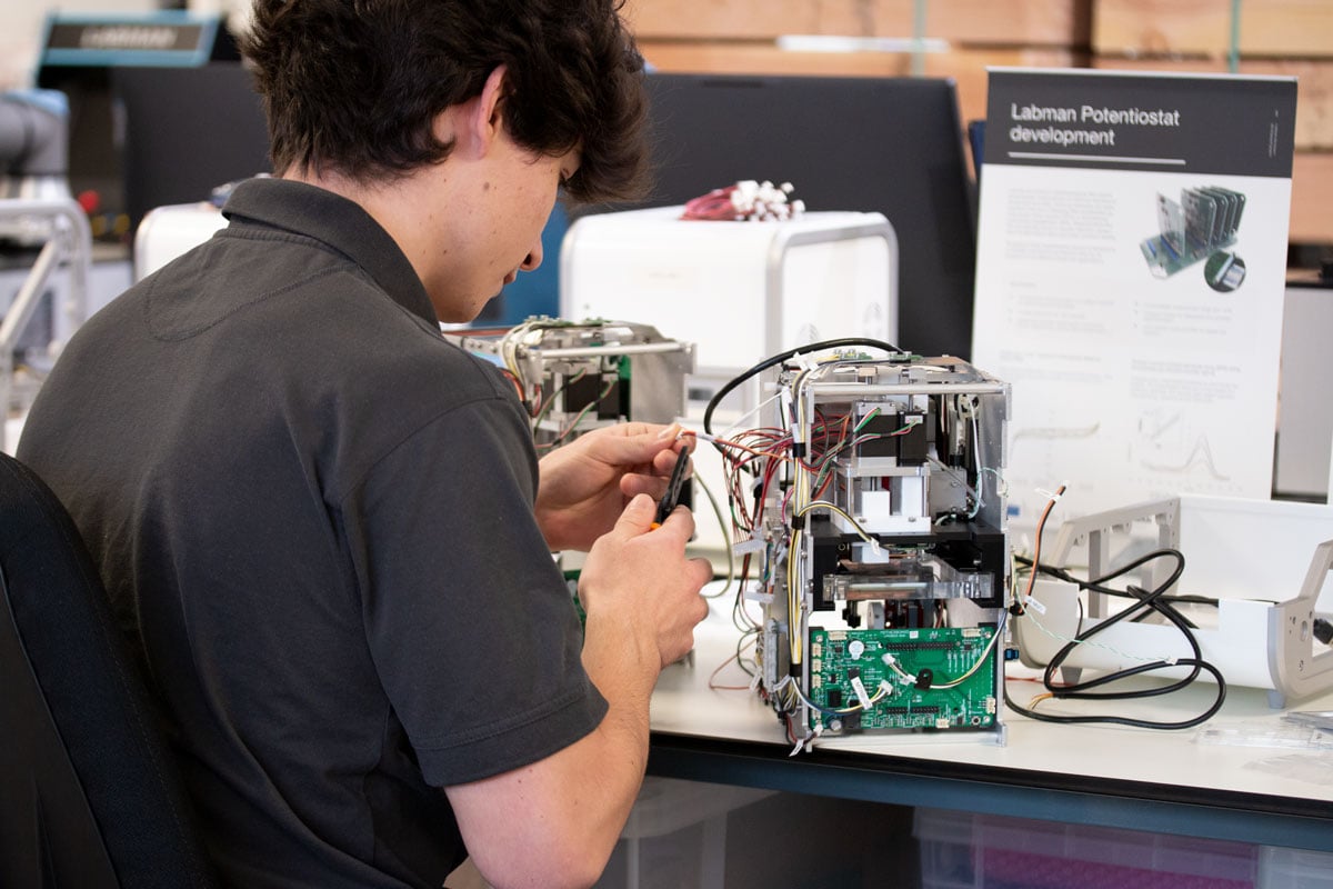 Intern Mario completing electrical wiring