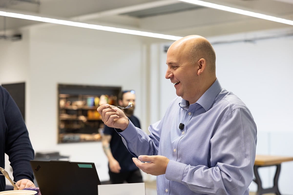 Labman's Paul Hollywood (Ian) smiling, tasting bakes