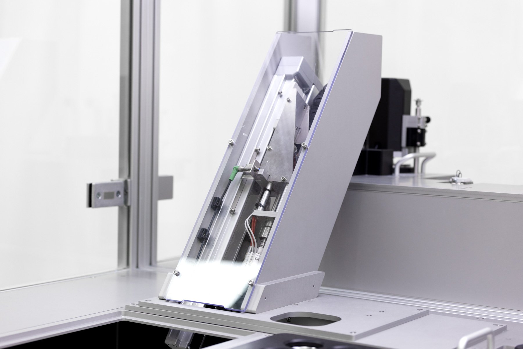 A custom built dual asymmetric centrifuge (DAC) loading system
