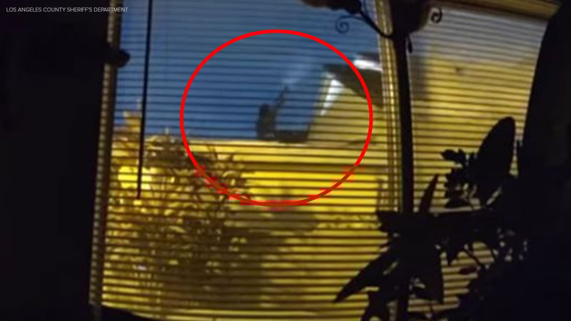 LASD bodycam footage showing Jerman Magana on rooftop with shotgun