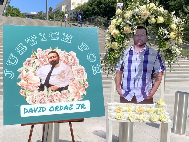 Memorial posters of David Ordaz Jr. displayed outside Los Angeles County courthouse