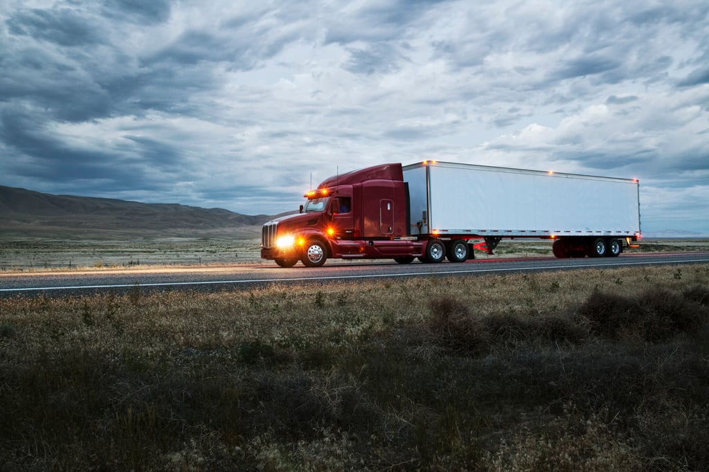Long-distance moving Arcadia truck from OverEasyMovers on the highway.