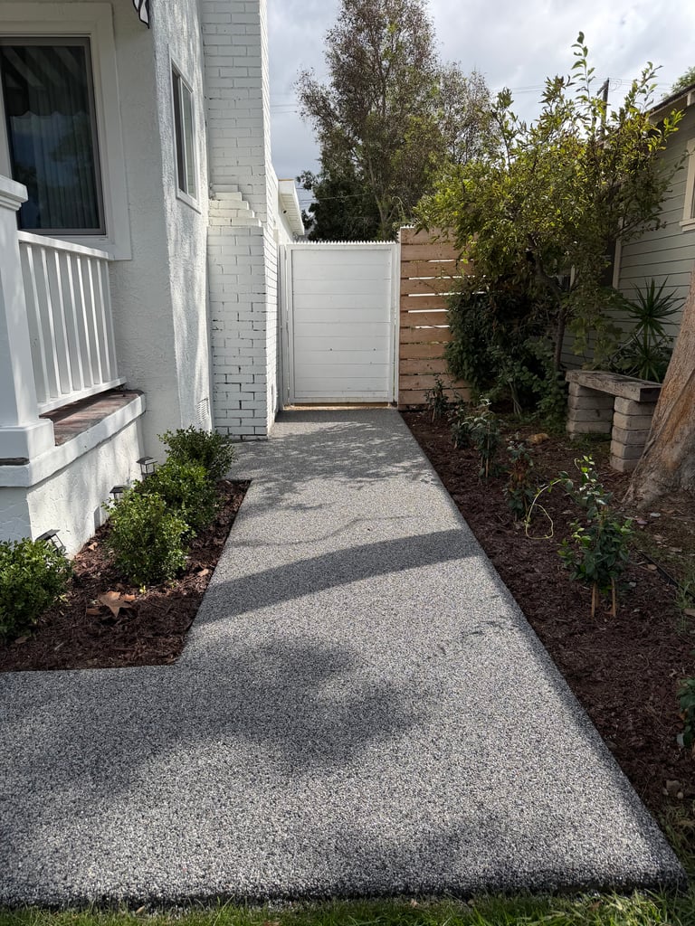 IMG_8518 Stone carpet walkway resurfaced with pebble epoxy overlay, durable and eco-friendly outdoor pathway installation.