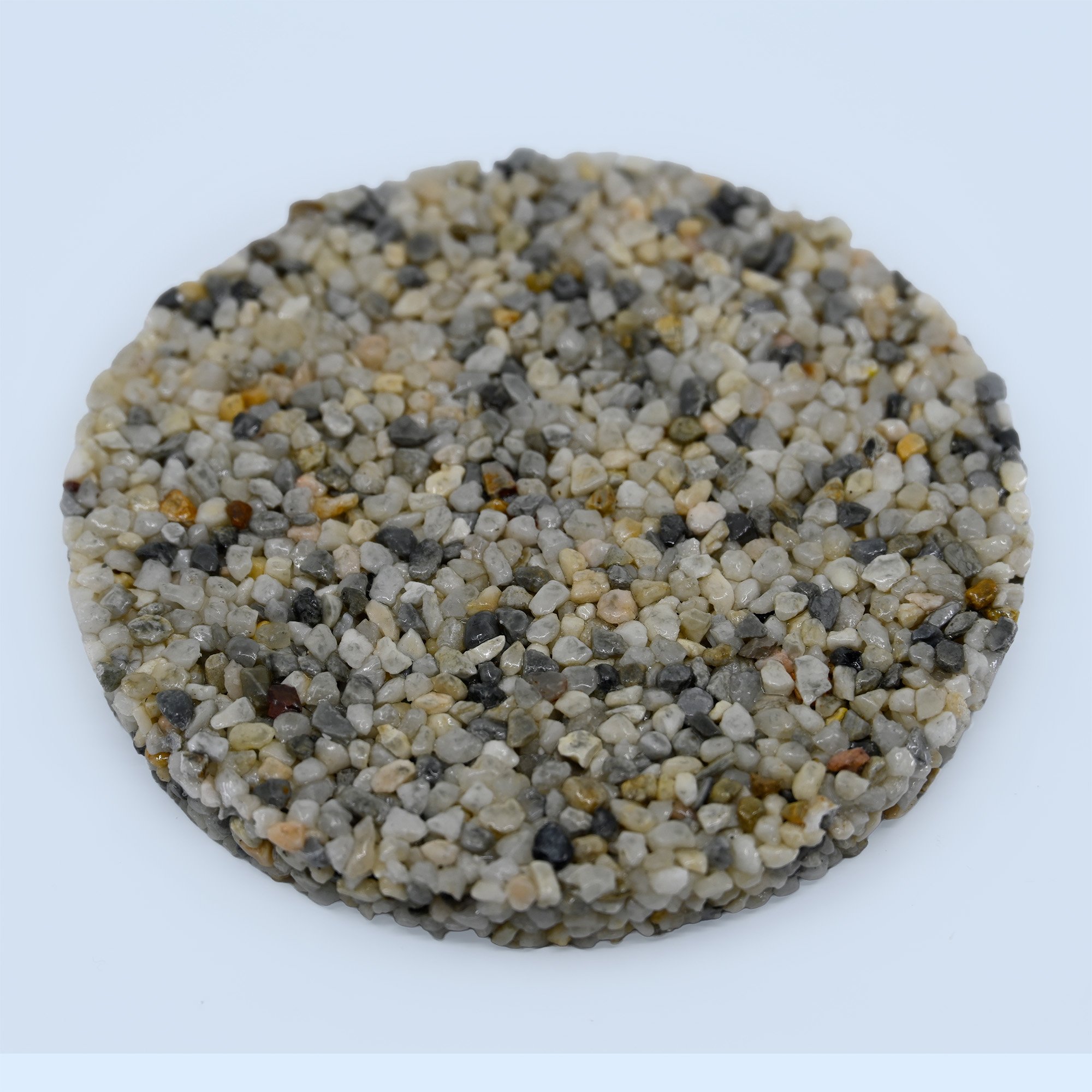 Mini Pearl Pebble Epoxy Blend sample – ivory and silver river pebbles used in luxury stone carpet flooring