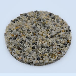 Mini Pearl Pebble Epoxy Blend sample – ivory and silver river pebbles used in luxury stone carpet flooring