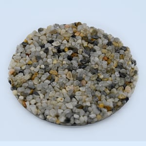 Pearl pebble epoxy blend sample – premium stone carpet flooring overlay.