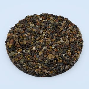 Red Agate pebble epoxy sample – premium stone carpet flooring.