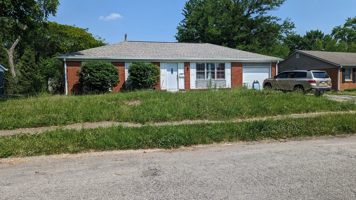Inherited 1960s Evansville home sold as-is for cash by two brothers through Spectrum Property Solutions.