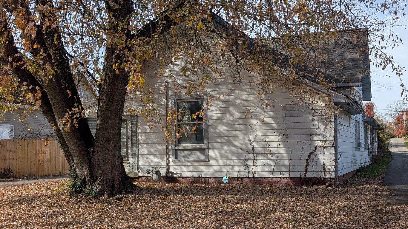 1930s Louisville rental property needing major repairs and lacking central AC, sold by tired landlord