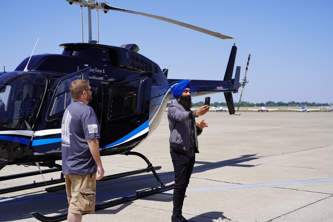 Jaspreet Posting on IG in front of Steven's helicopter