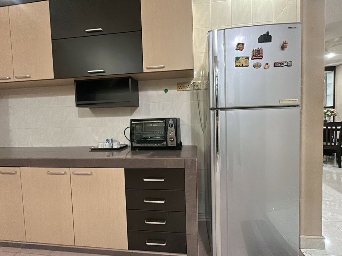 Kitchen at C05 Family Rinting Homestay, photo 3