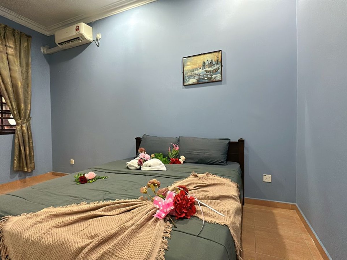 Room at C05 Family Rinting Homestay, photo 4