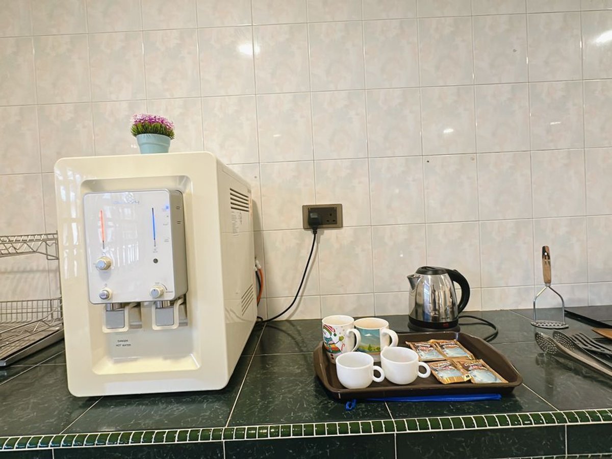 Kitchen at C03 Golden Rinting Homestay In Taman Rinting, photo 3