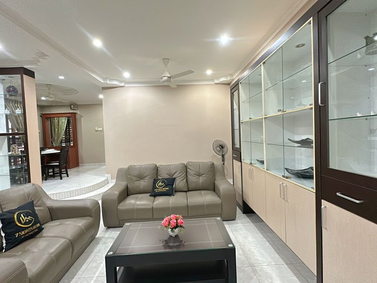 Living Room at C05 Family Rinting Homestay, photo 9