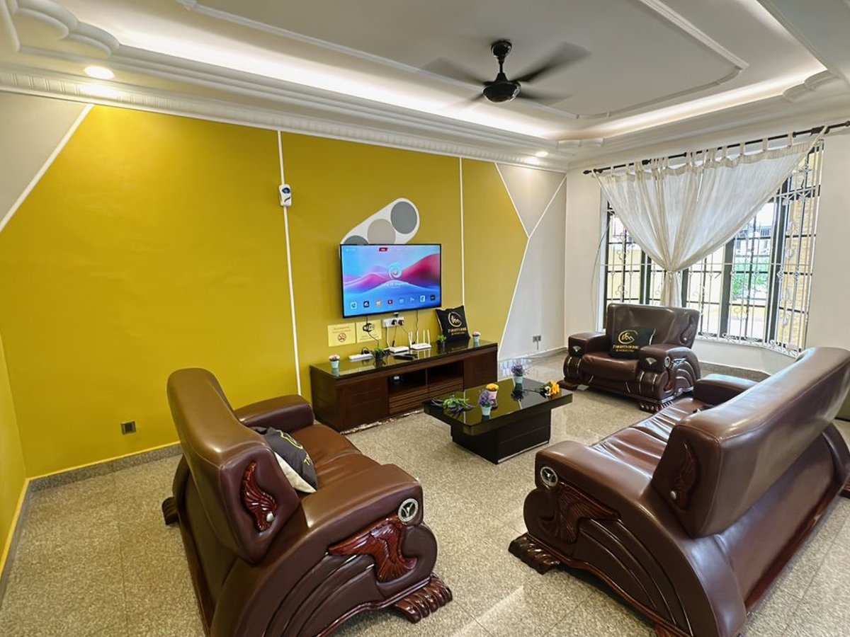 Living Room at C03 Golden Rinting Homestay In Taman Rinting, photo 5