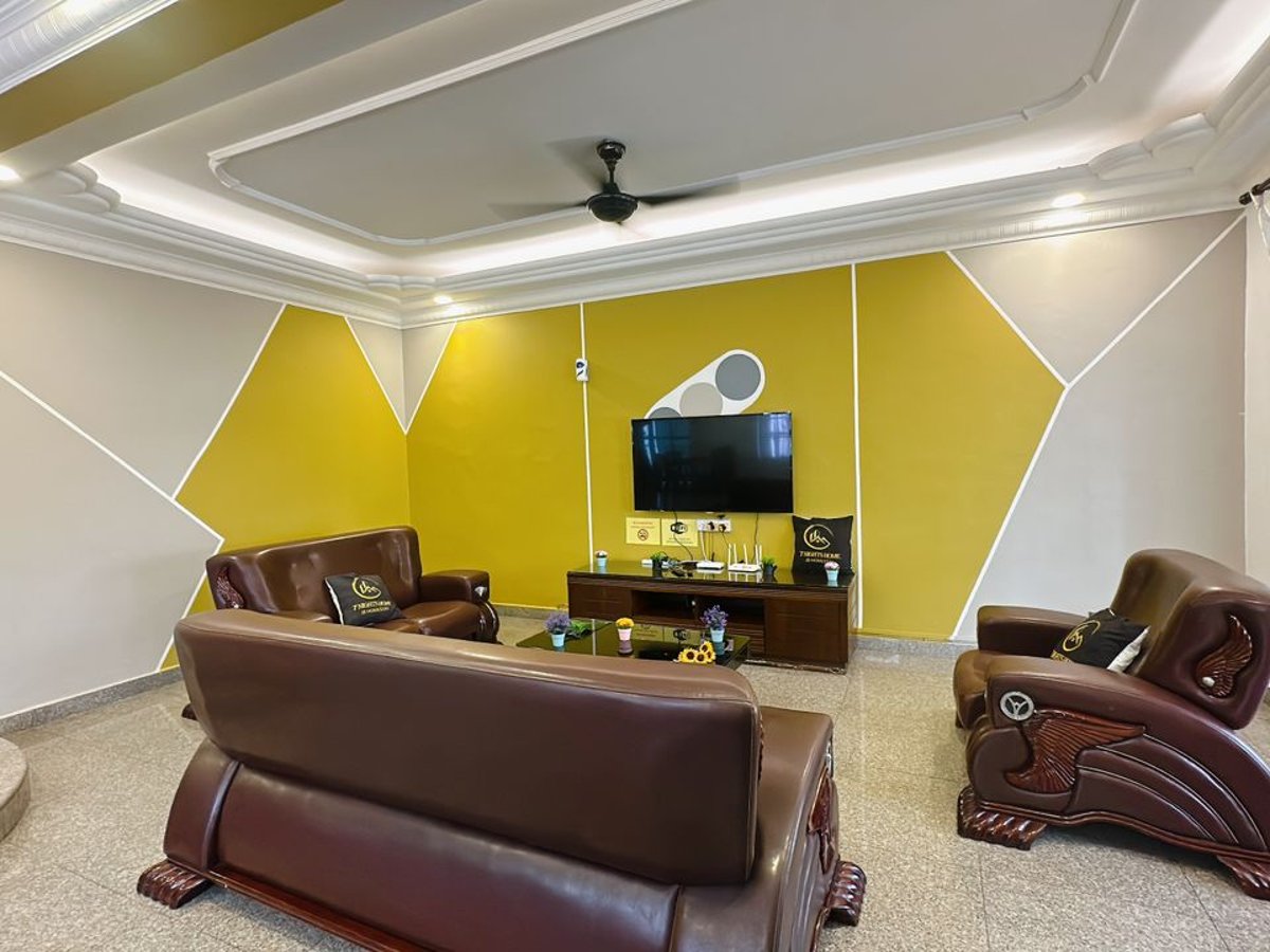 Living Room at C03 Golden Rinting Homestay In Taman Rinting, photo 11
