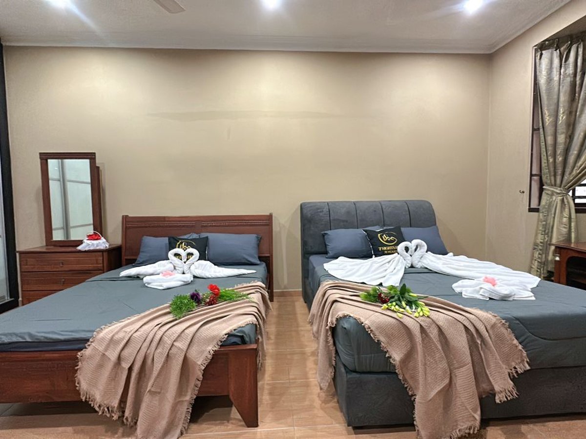 Room at C05 Family Rinting Homestay, photo 3
