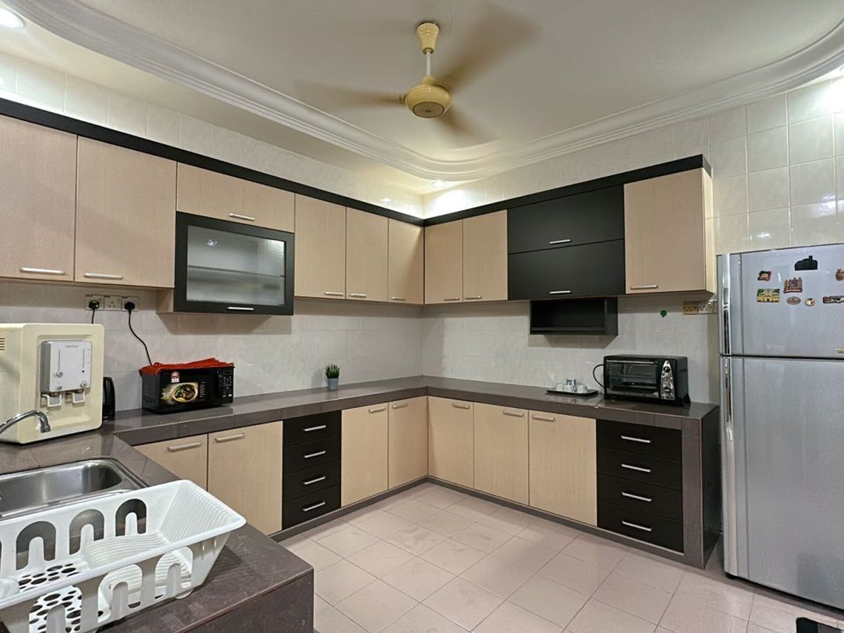 Kitchen at C05 Family Rinting Homestay, photo 5