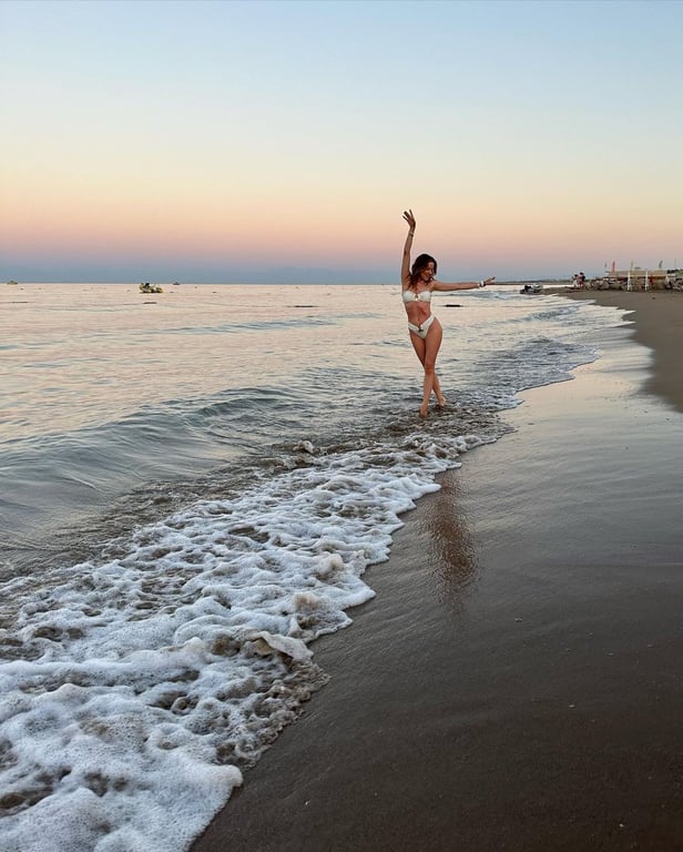 Наталка Денисенко показала фотосесію у купальнику і нарвалась на жорстку критику - фото 4