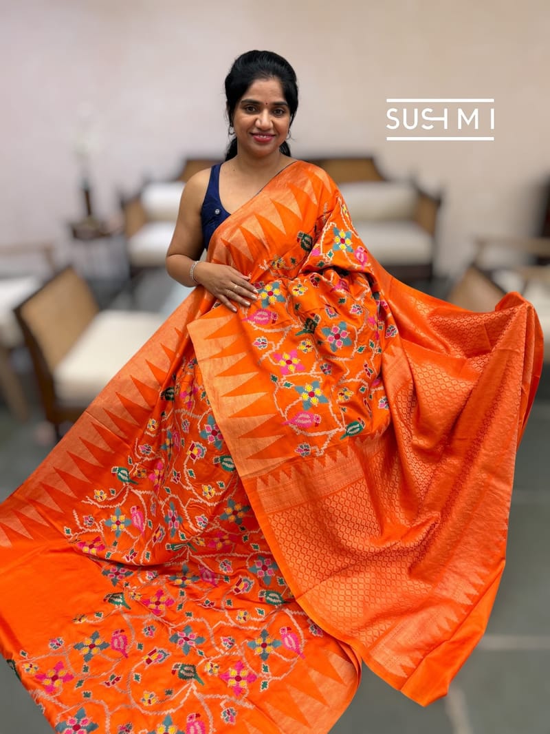 Orange Kanjeevaram soft silk saree with patola inspired embroidery 