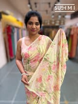 Pastel yellow printed georgette saree with handwork : S62F195
