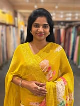 Yellow georgette sequence saree with statement floral print SS5047