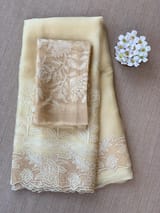 Pastel Yellow Organza Saree with tissue cutwork Rose border