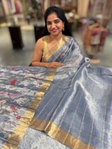 Blue tissue checks Saree with pythani inspired embroidered tissue blouse